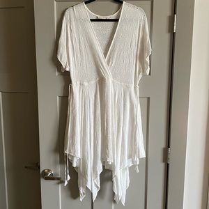 Asymmetrical hem mini dress with eyelet detail